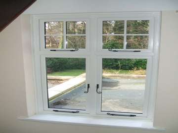 Internal view of a Storm window fitted with Monkey Tail Peg and stays suited with Monkey Tail handles, To give the look of a timber window Wirral timber sash windows